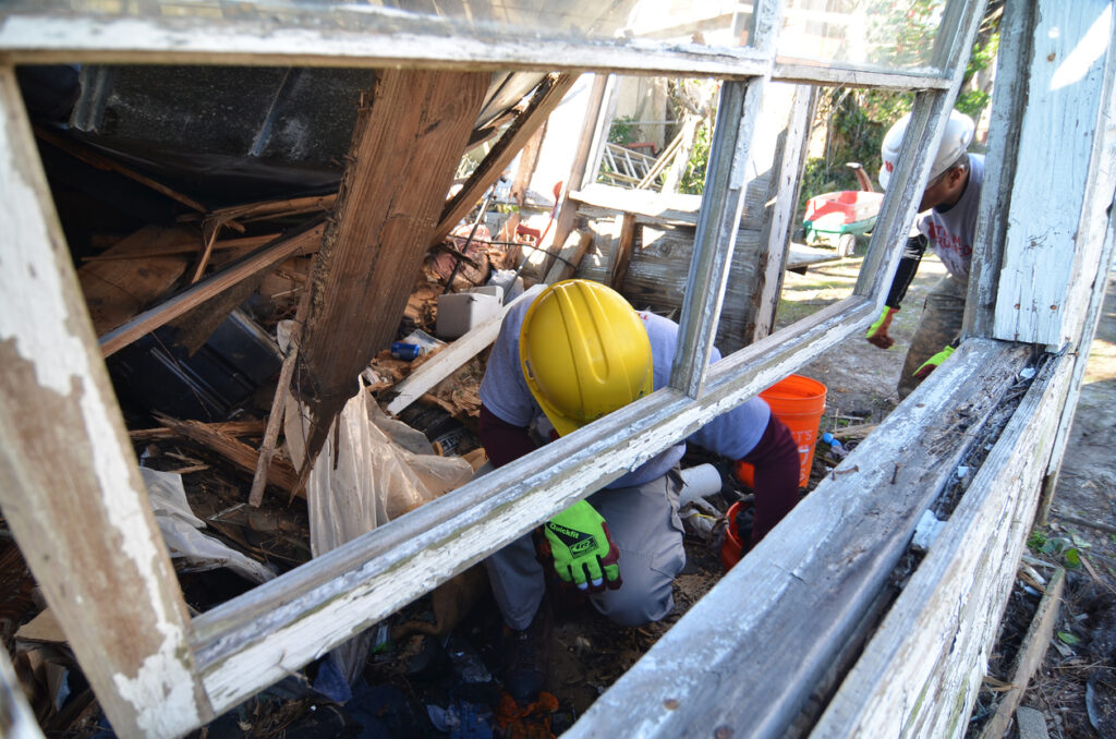 Crew working to rebuild homes and structures that were damaged and destroyed after Hurricane